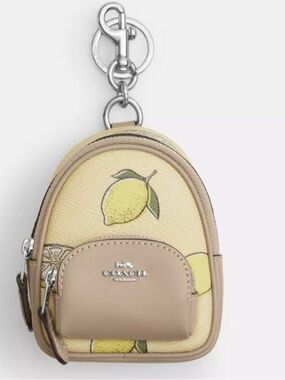 NWT  Coach Mini Court
Backpack Bag Charm with Lemon Print CAP03 💛